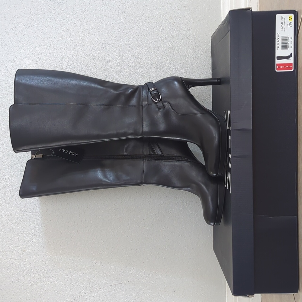 Tall black high heel boots